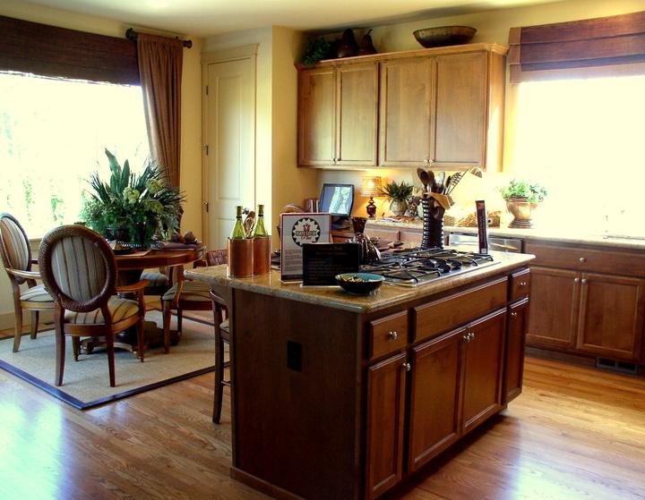 Kitchen and dining area with wood floors